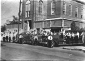 "Key West Fire Department group portrait in front of Fire Station #1 located under the old City Hall building on Greene Street" 19--